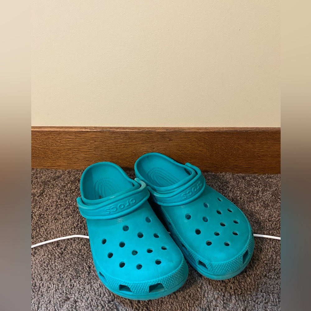 Teal crocs size 9